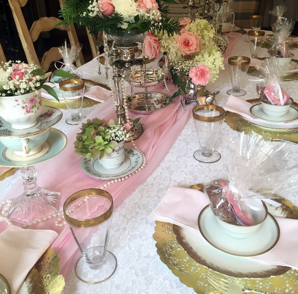 Lovely wedding shower tablescape using 12" gold paper doilies